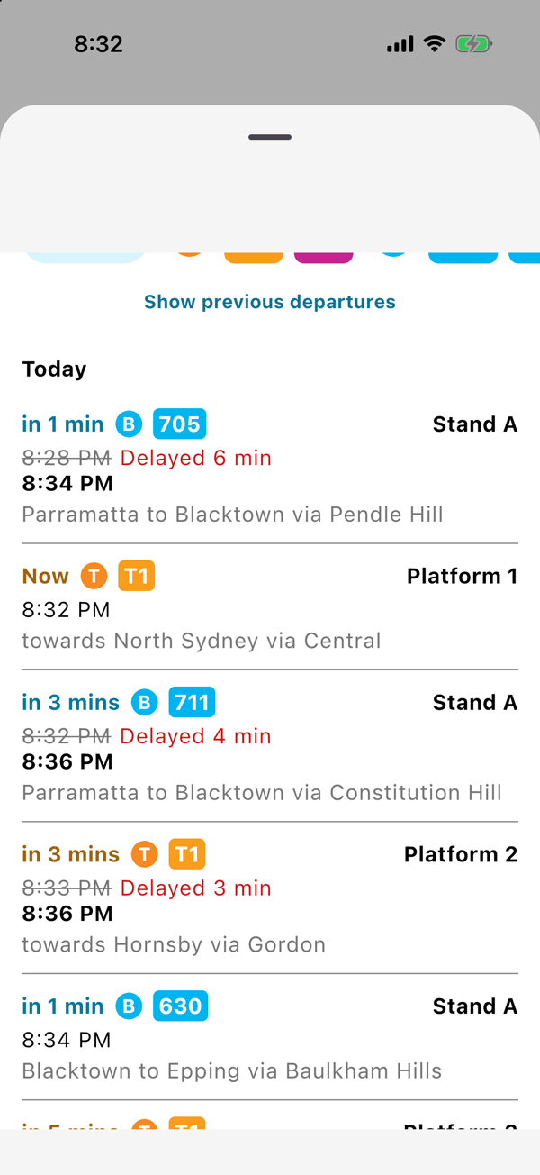 A live departure board mixing modes, with a bus in 1 min from Stand A, a train showing Now on Platform 1, and delays with the old time struck through
